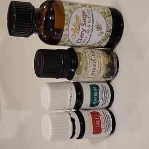 ESSENTIAL oils Digize, Peppermint, Lemon Grass and Clary Sage. Open but full.